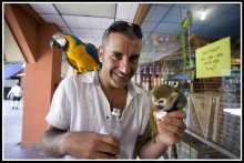 DR Dov with parrot and monkey