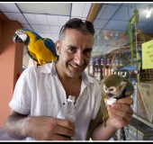 DR Dov with parrot and monkey